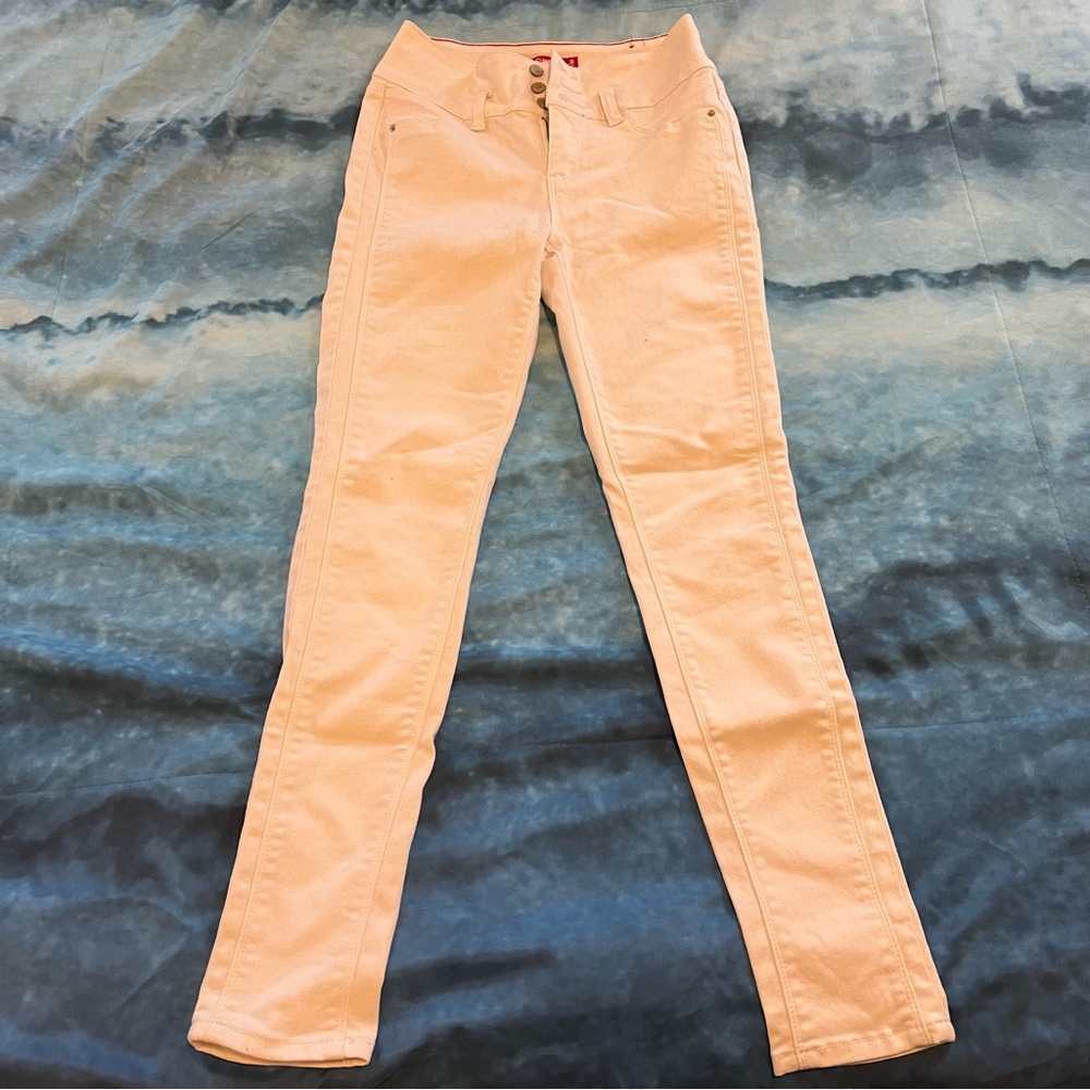 White mid-rise skinny jeans